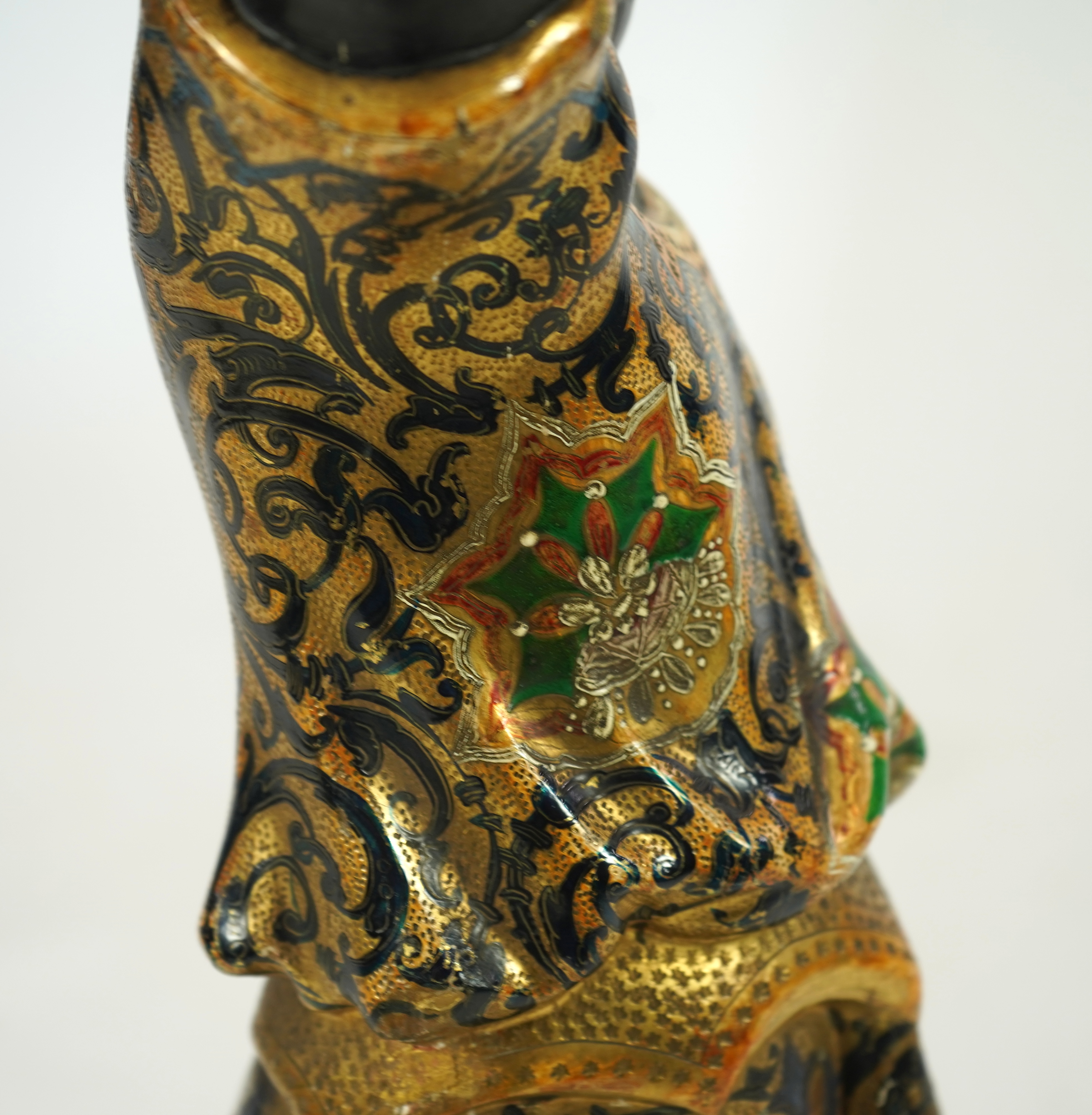 A 19th century Italian carved wood and composition polychrome painted blackamoor torchere
